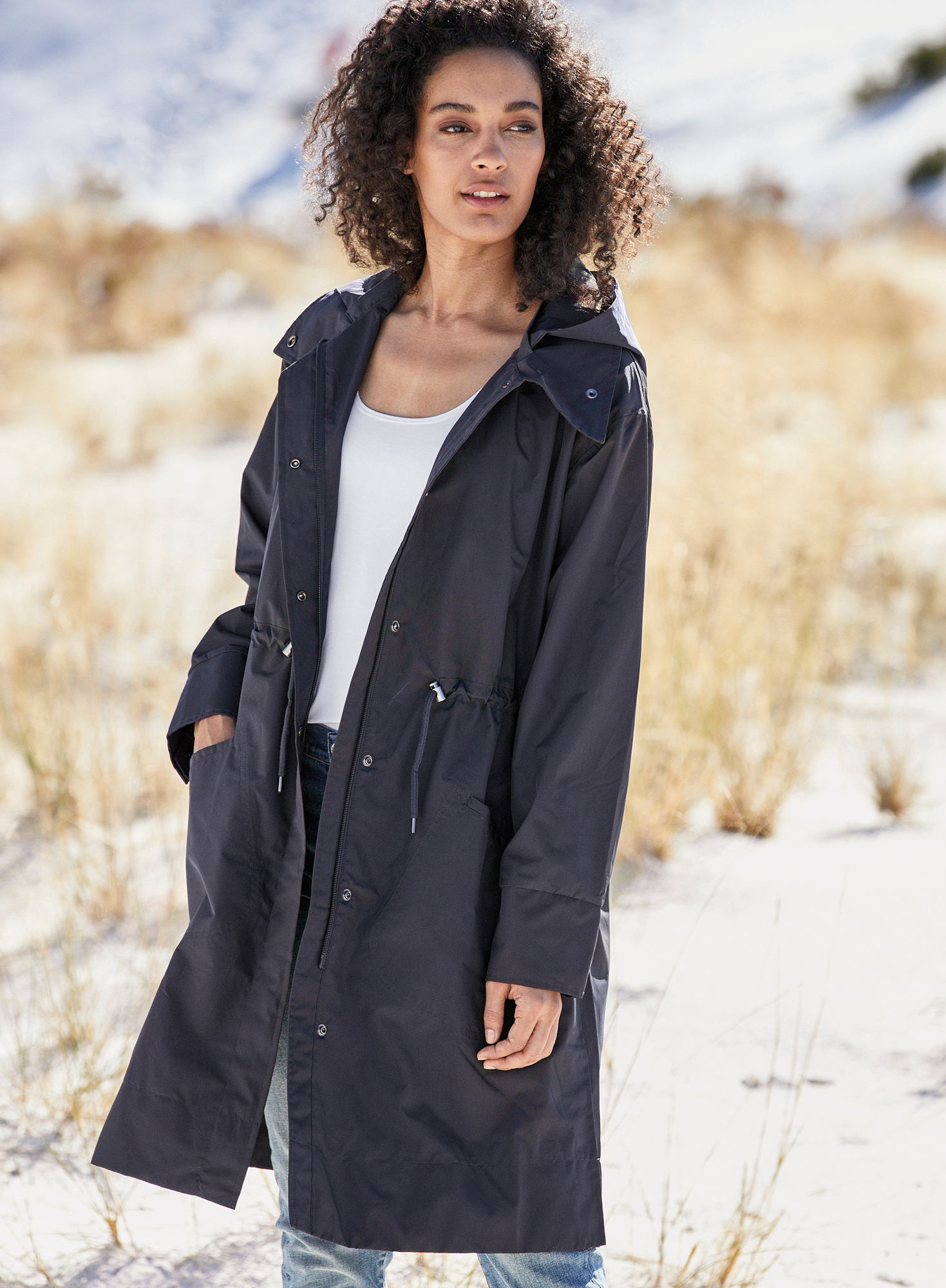 Winter raincoat with store hood