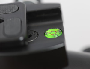 Close-up shot of bubble level built into a Cameron tripod.