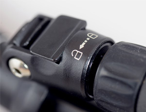 Close-up shot of locking mechanism that holds the built-in monopod to the Cameron T310BH Tripod in place.