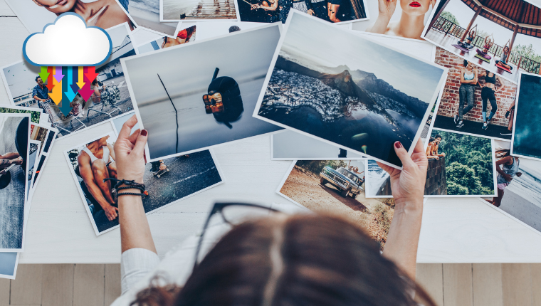 A woman looking at printed photos