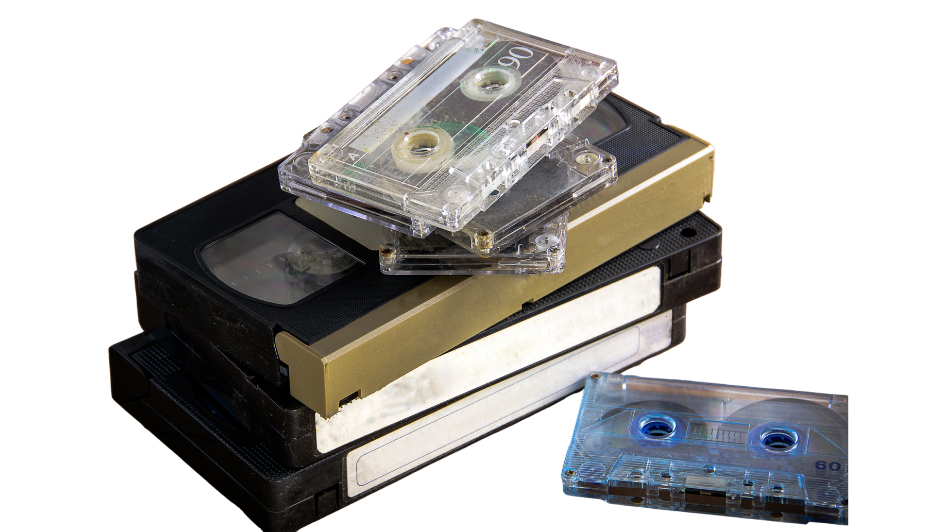A small pile of video and audio cassette tapes