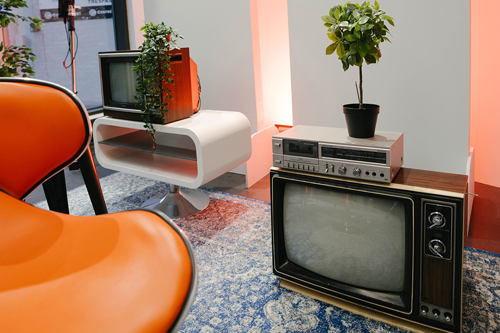 vintage television sets used as decor