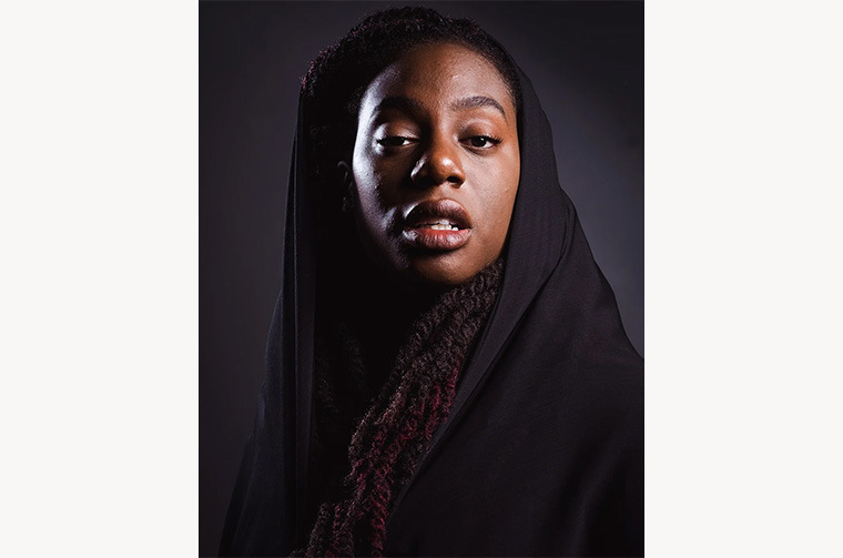 Portrait of a young black woman with long hair 
