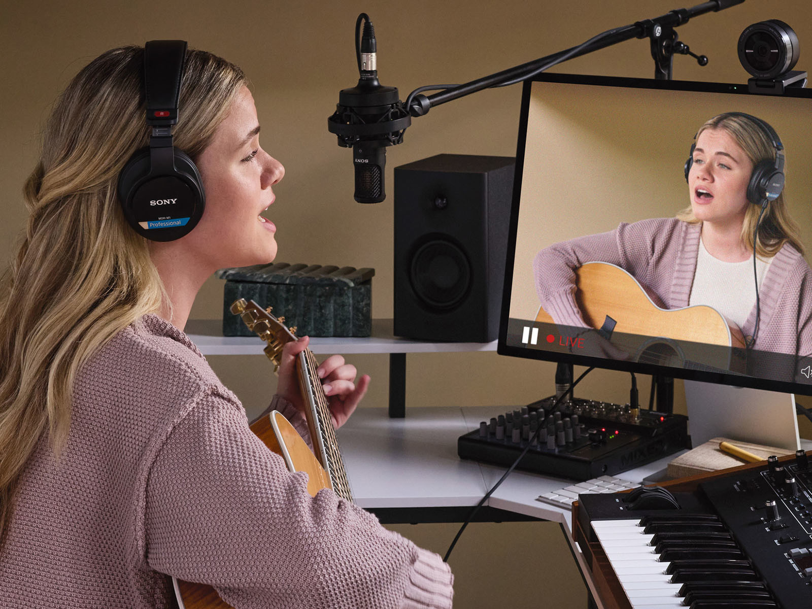 A singer uses Sony MDR-M1 Headphones