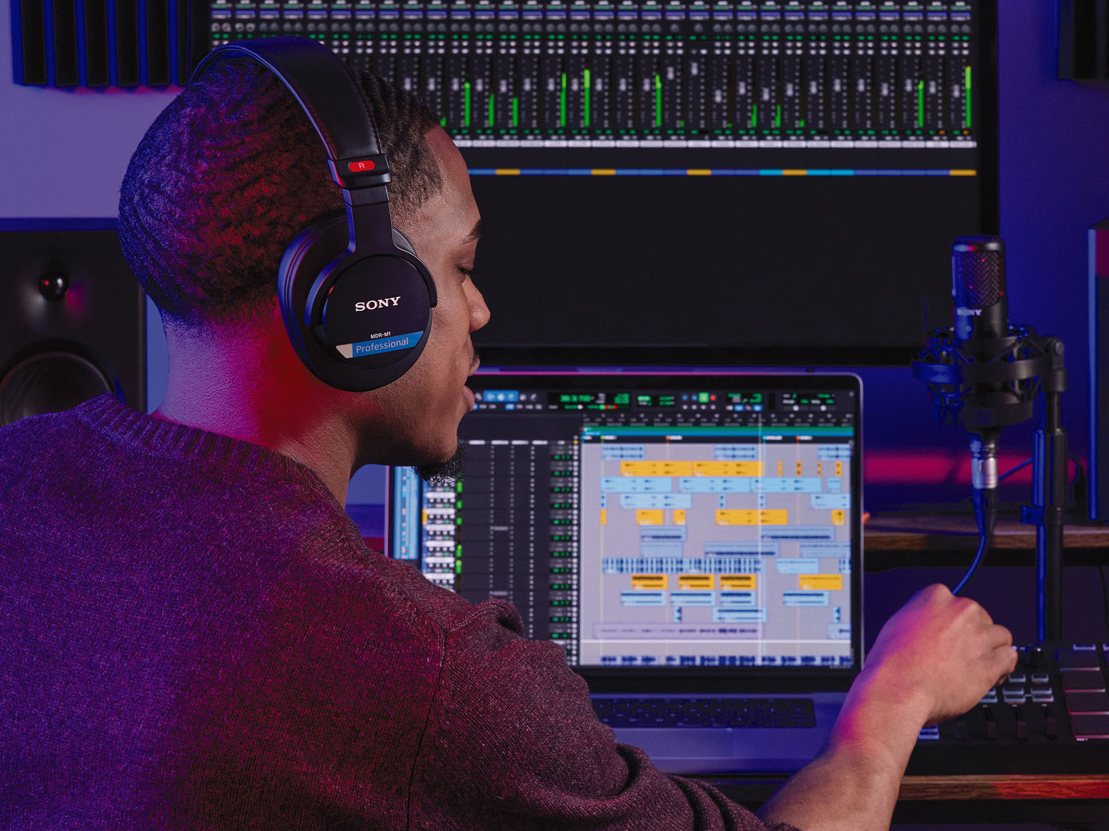 A sound engineer uses Sony MDR-M1 Headphones