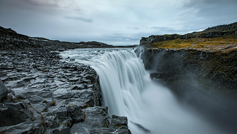 a long exposure photograph of a waterfall