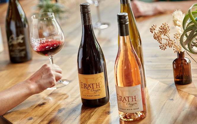 Bottles of Erath wine on a table for a tasting