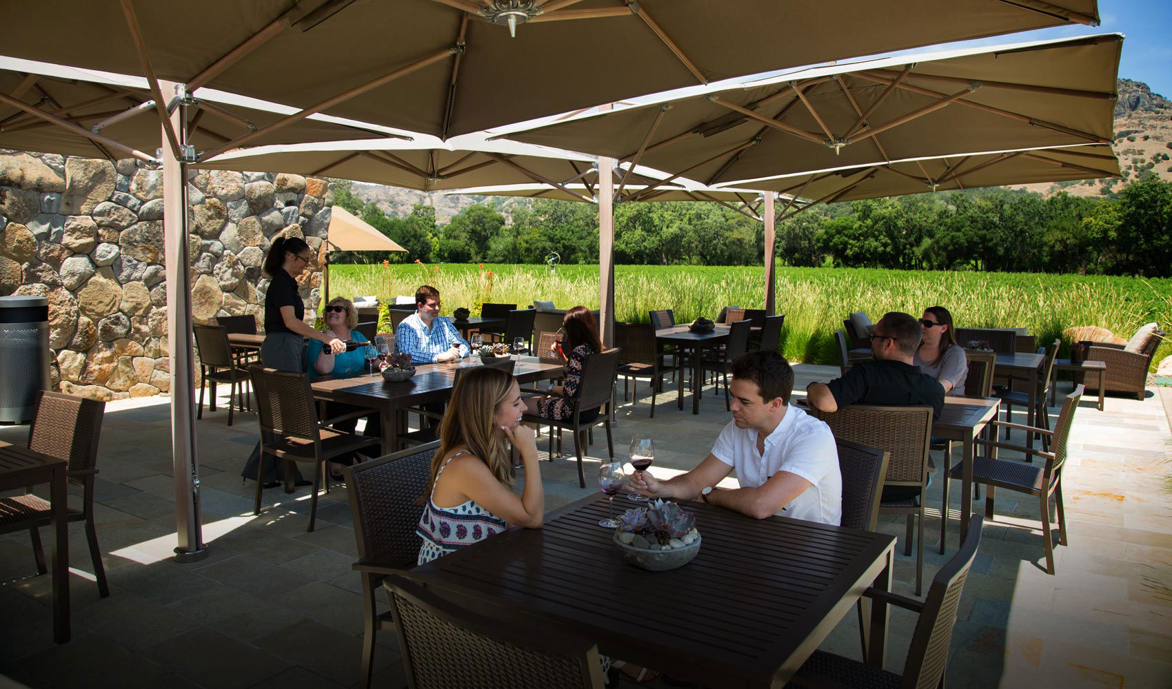 People sitting at tables outdoors at Stag's Leap Wine Cellars