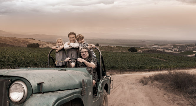 Gary, Mark, and Jeff Pisoni in a Jeep