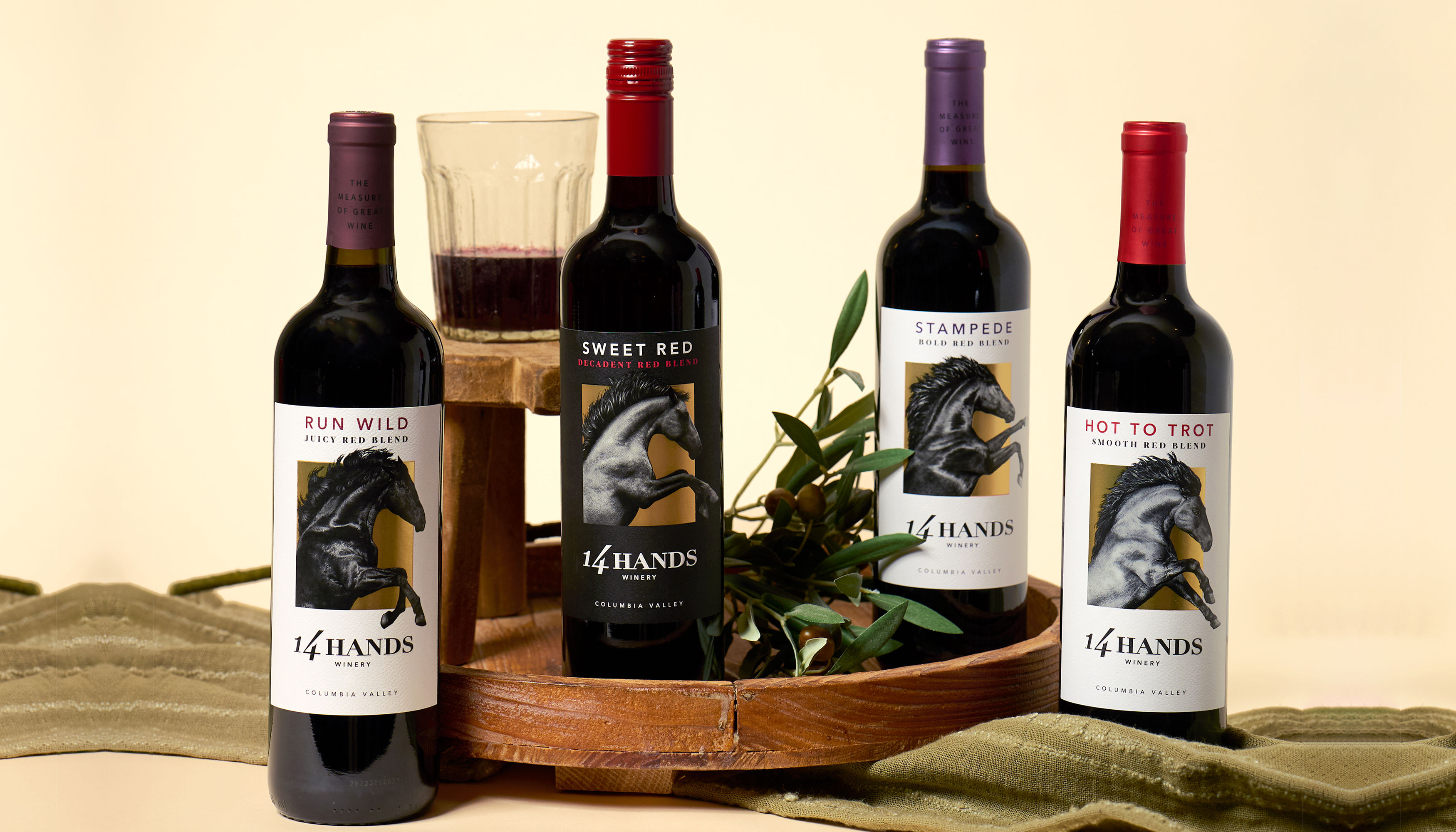 14 Hands Wine on a table