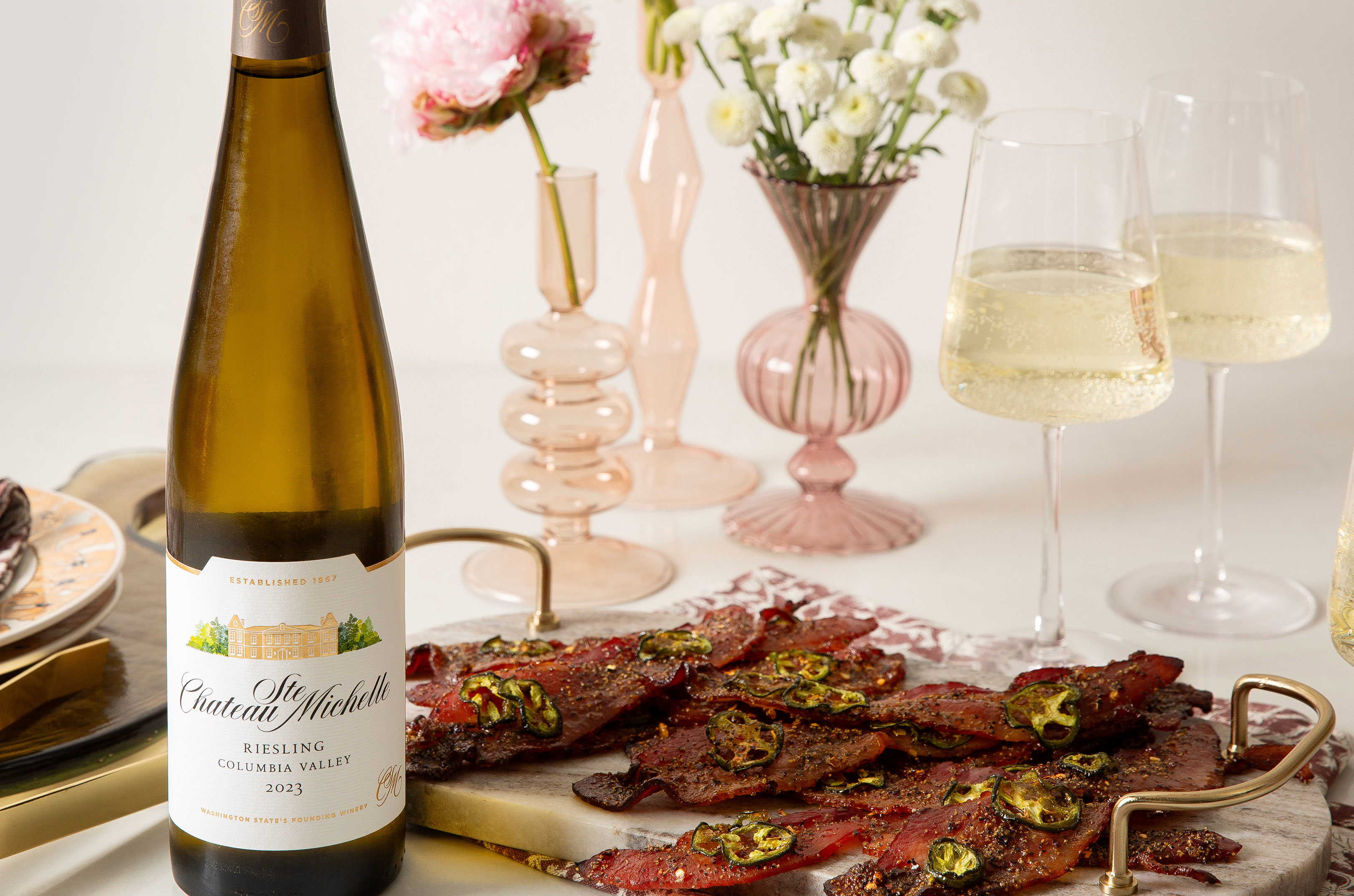 Platter of honey hot bacon and a bottle of Riesling