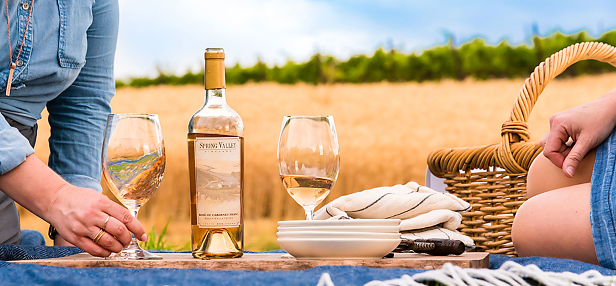People enjoying Spring Valley Vineyard Rosé outdoors