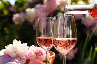 Glasses of Rosé being poured