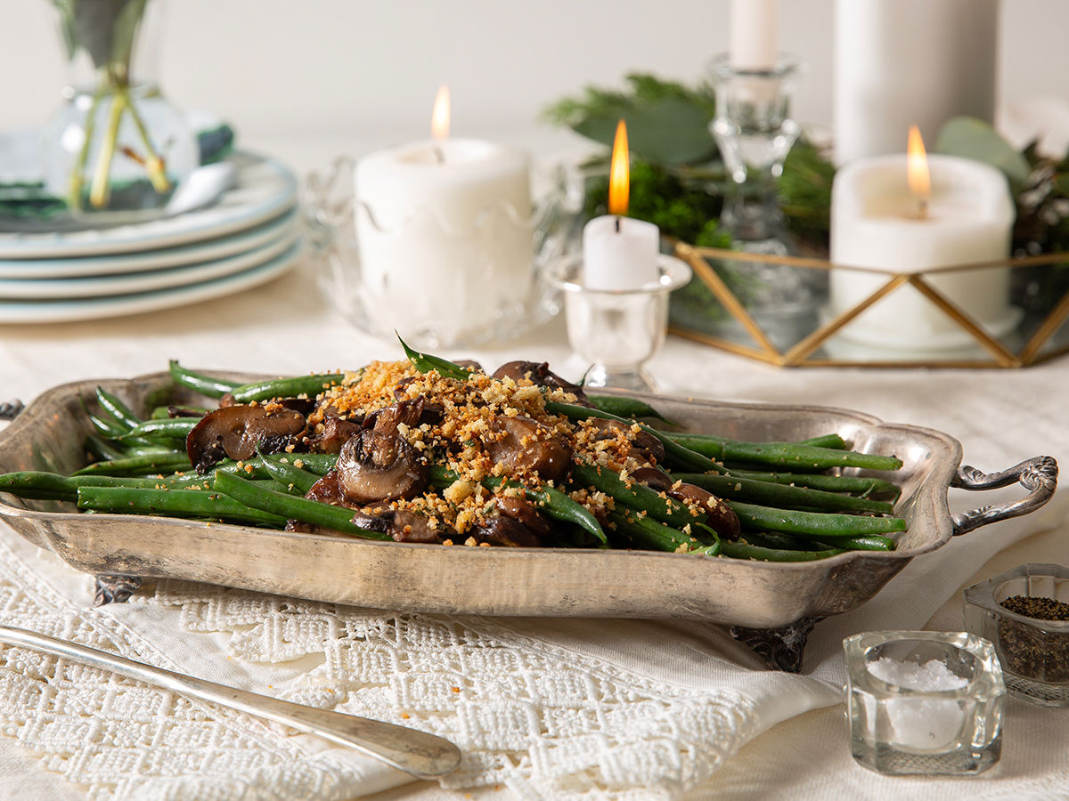 Green Beans and Mushrooms with Crispy Sage Breadcrumbs on a table