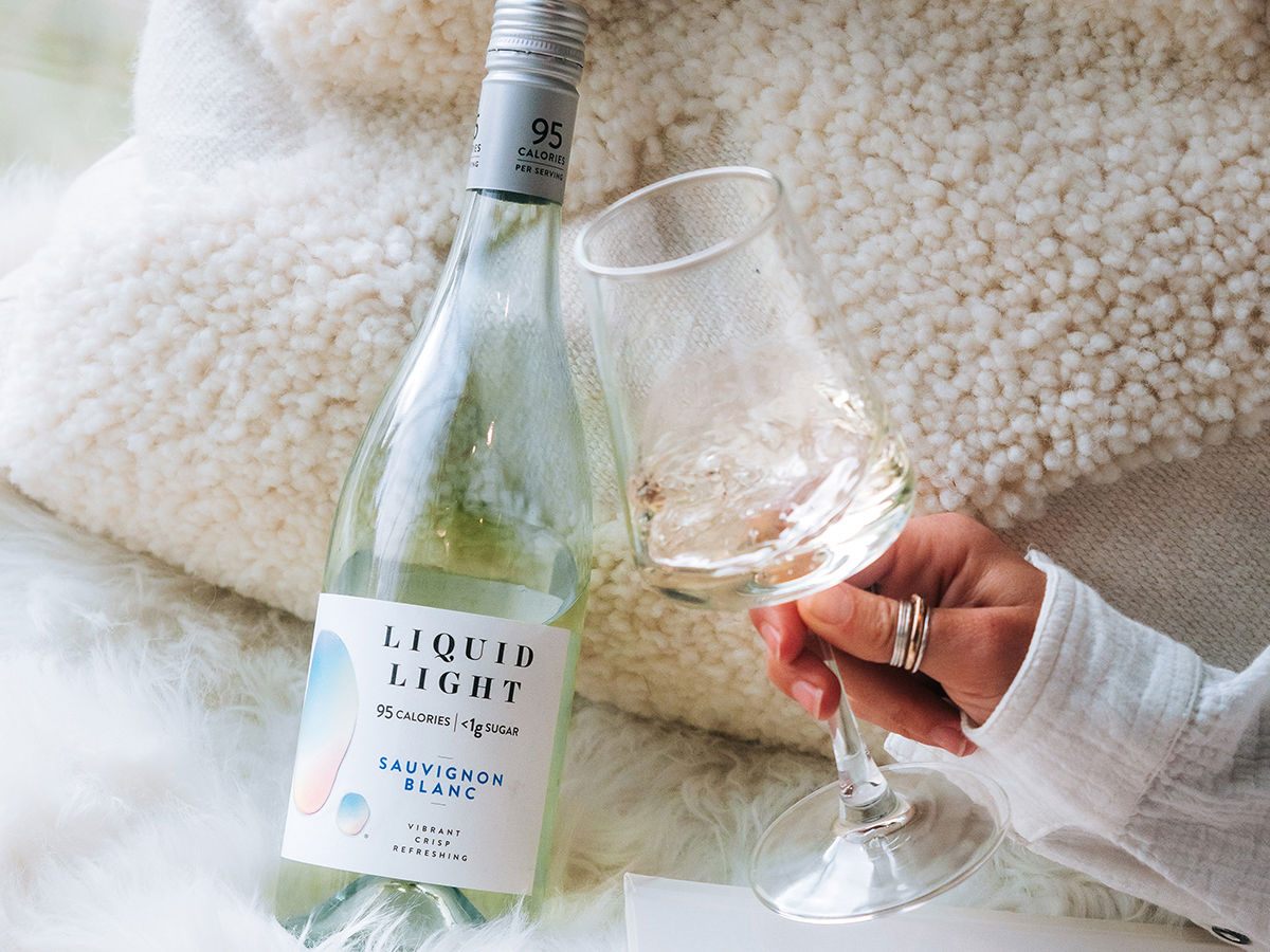 Bottle of Liquid Light Sauvignon Blanc and a wine glass