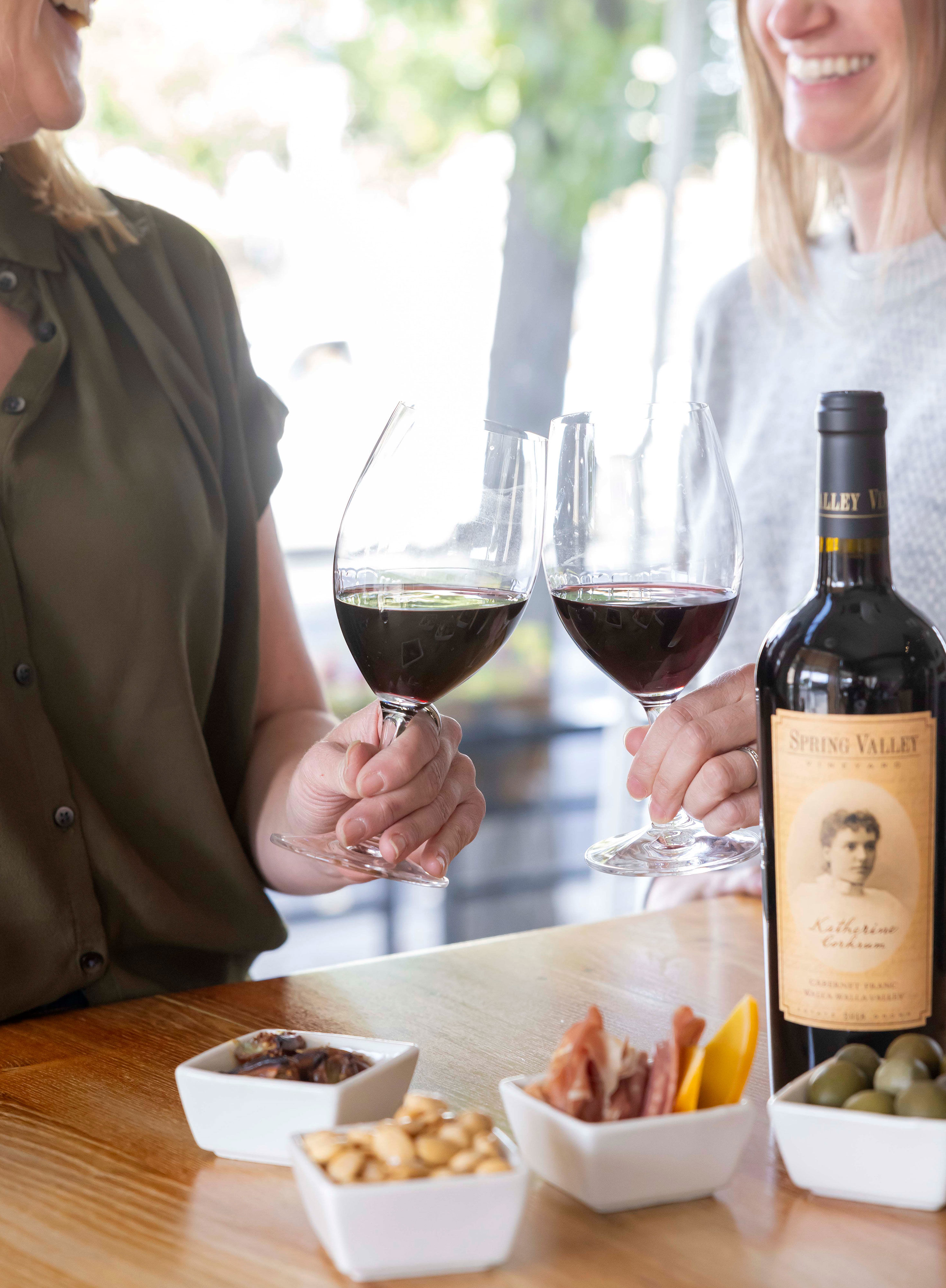 Women enjoying red wine and food pairings