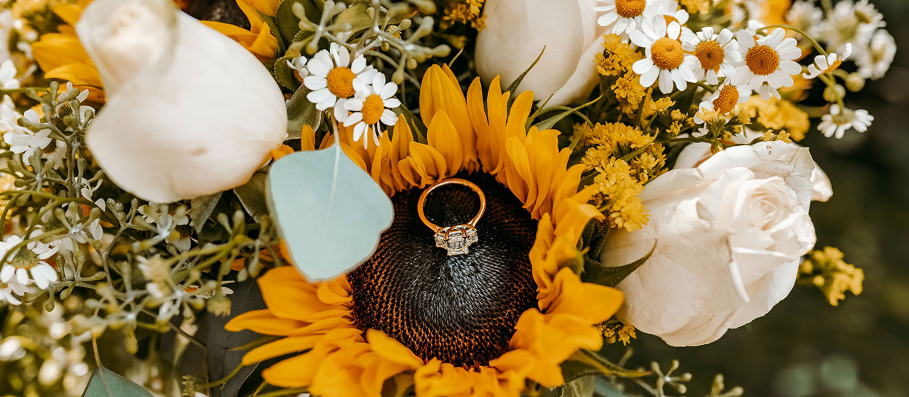 Flowers with an engagement ring