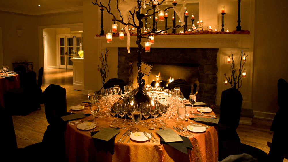Manor House table set up in front of the fireplace