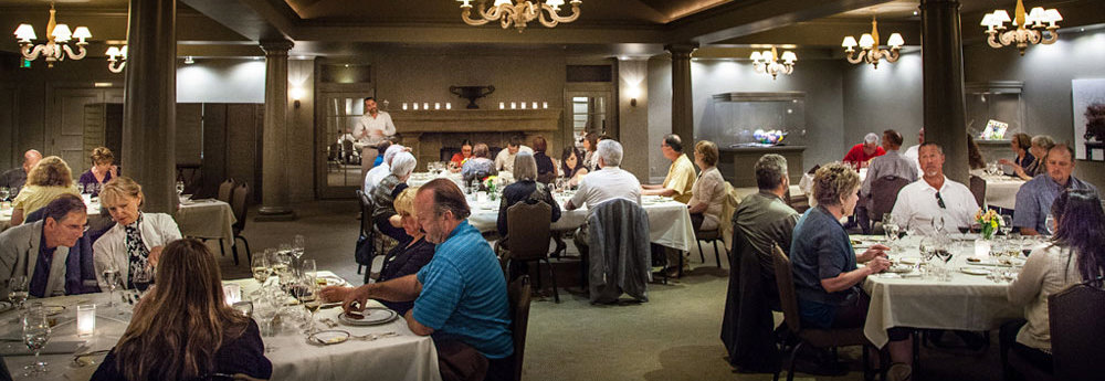 People enjoying a meal in the Chateau banquet room