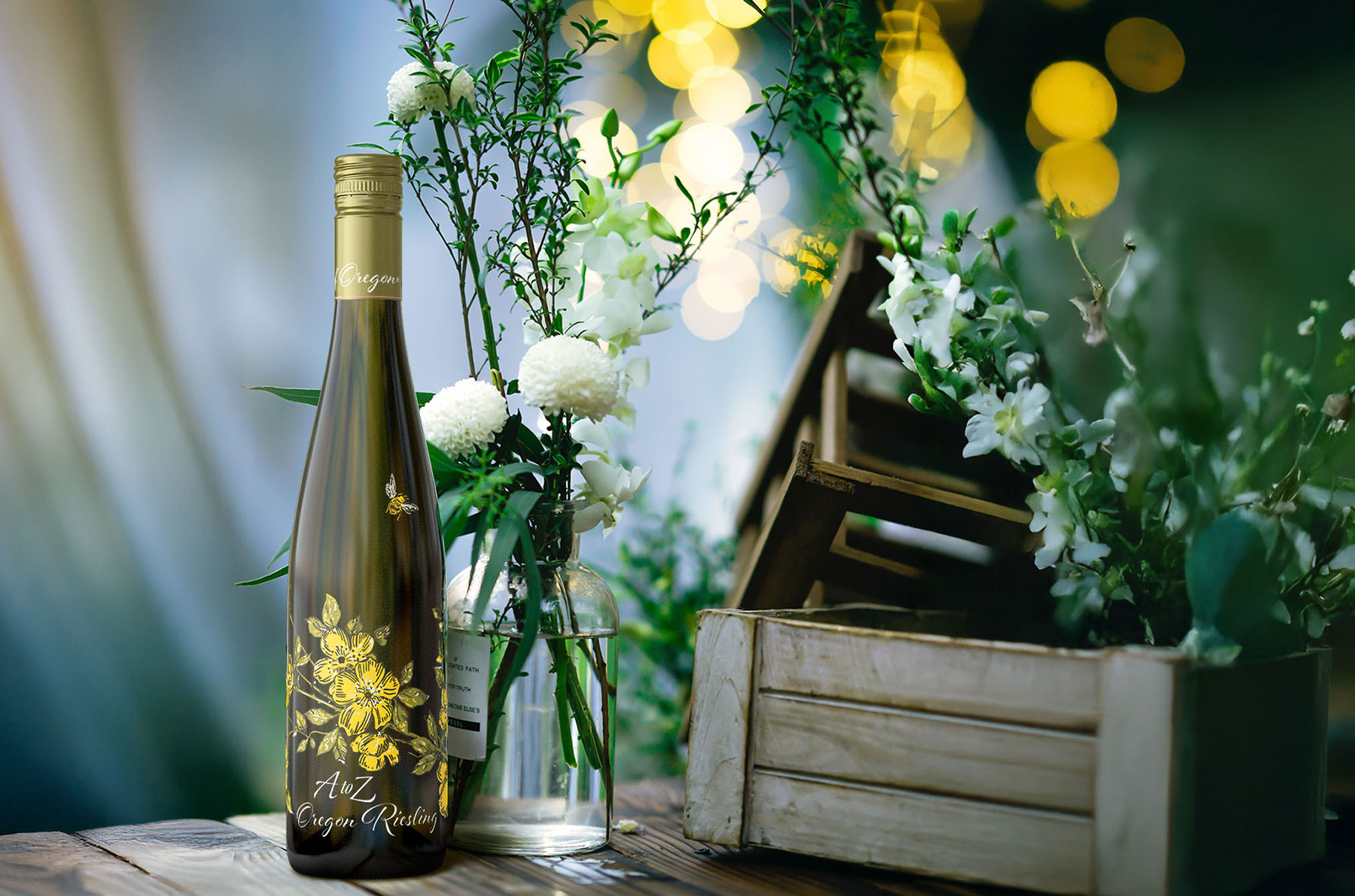 Bottle of A to Z Riesling with flowers
