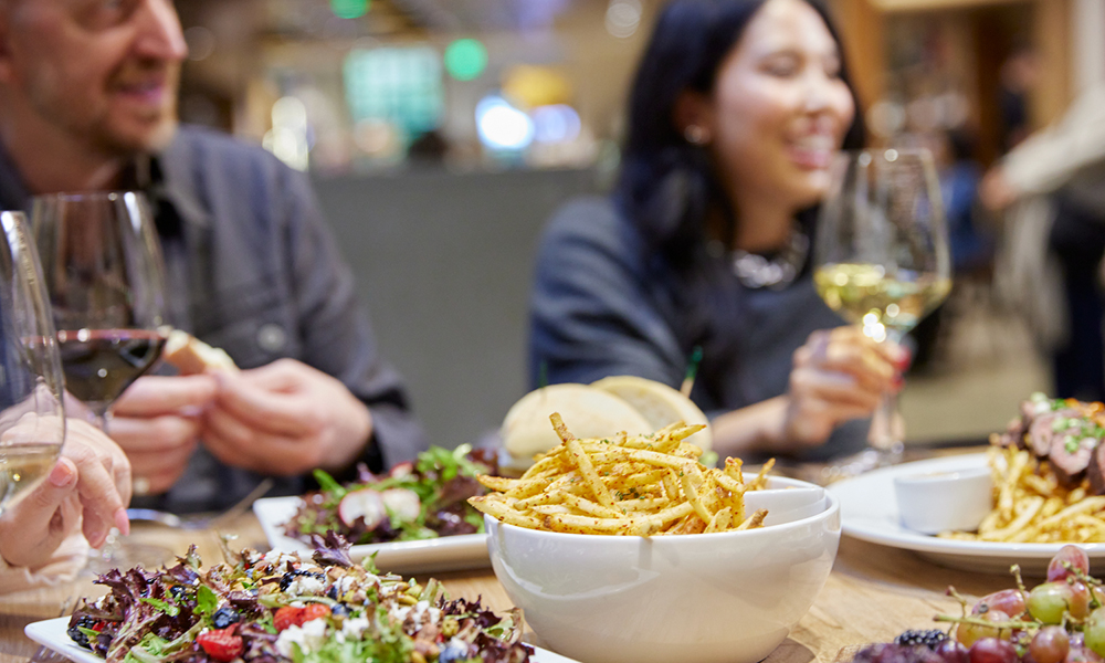 People enjoying wine and appetizers prepared by the Chateau kitchen