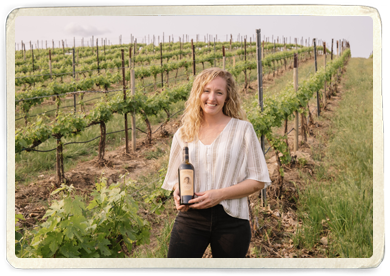 Kate Derby in the vineyard