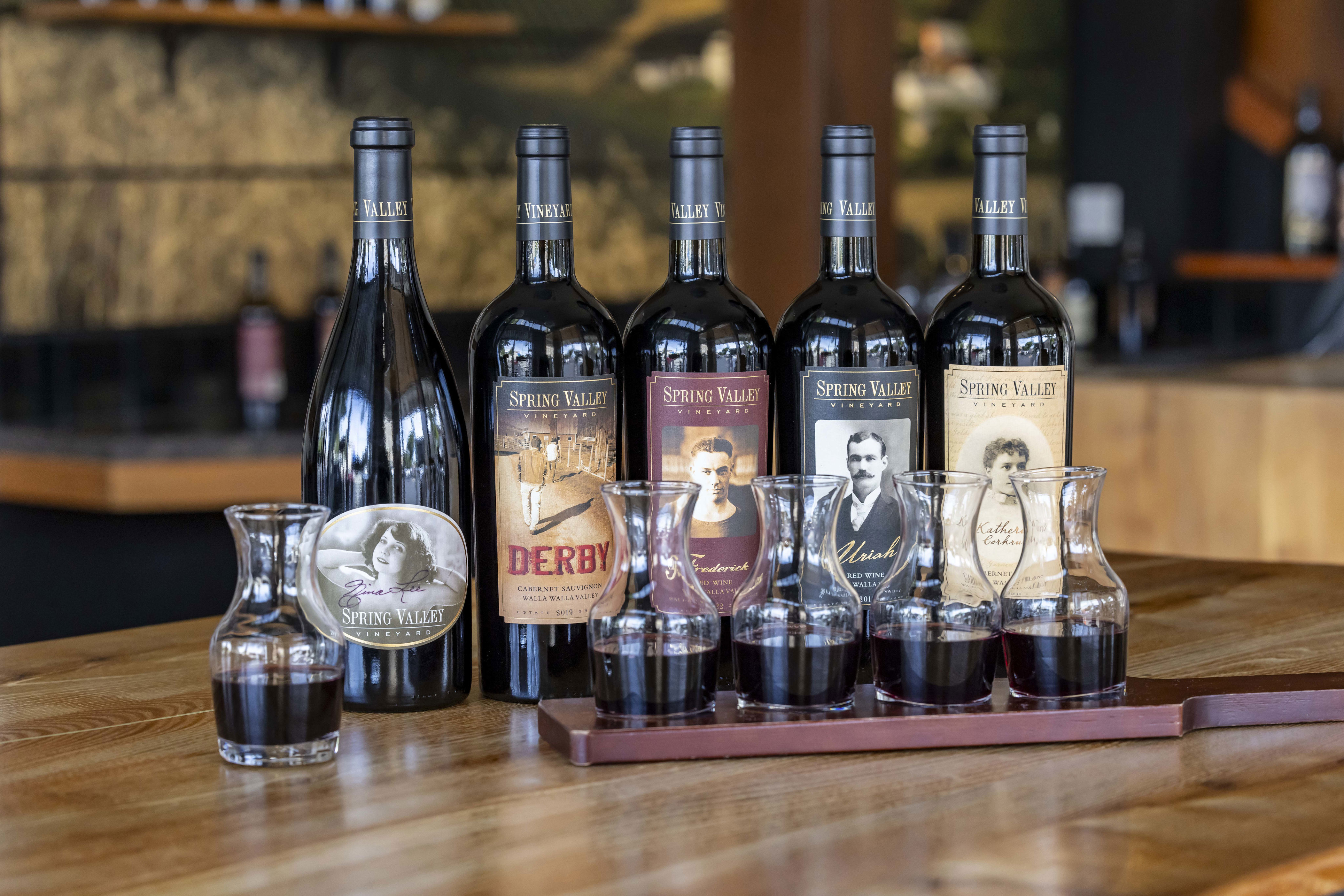 Bottles of Spring Valley Vineyard set up for a tasting