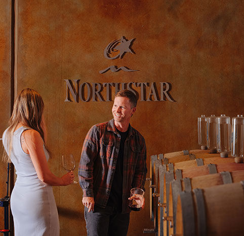 People enjoying the barrel blending experience