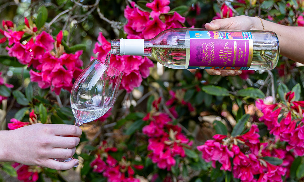 Pouring a glass of Midsummer's White