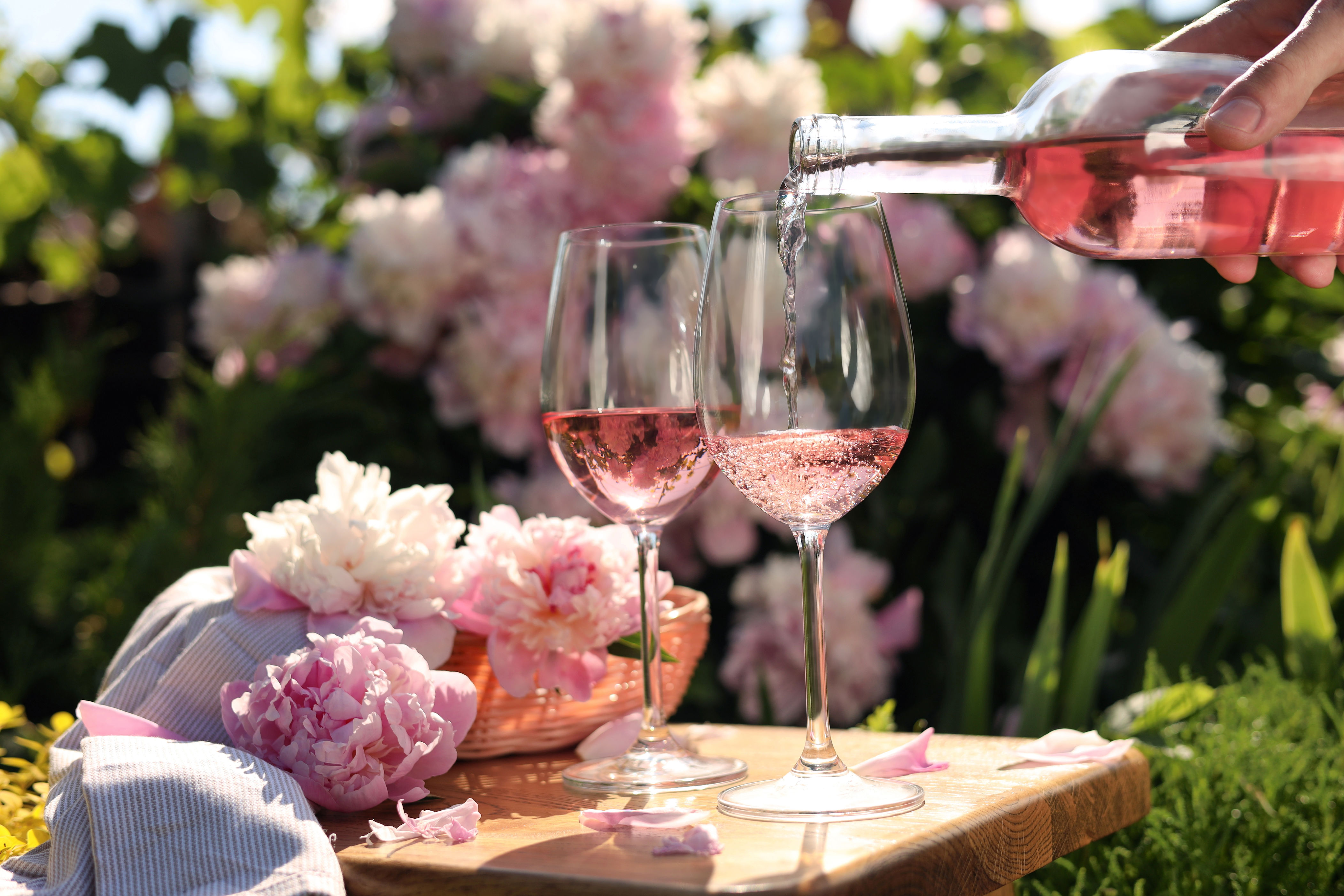 Glasses of Rosé being poured