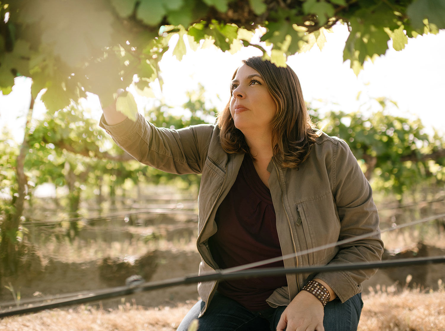 Katie Nelson in the vineyard