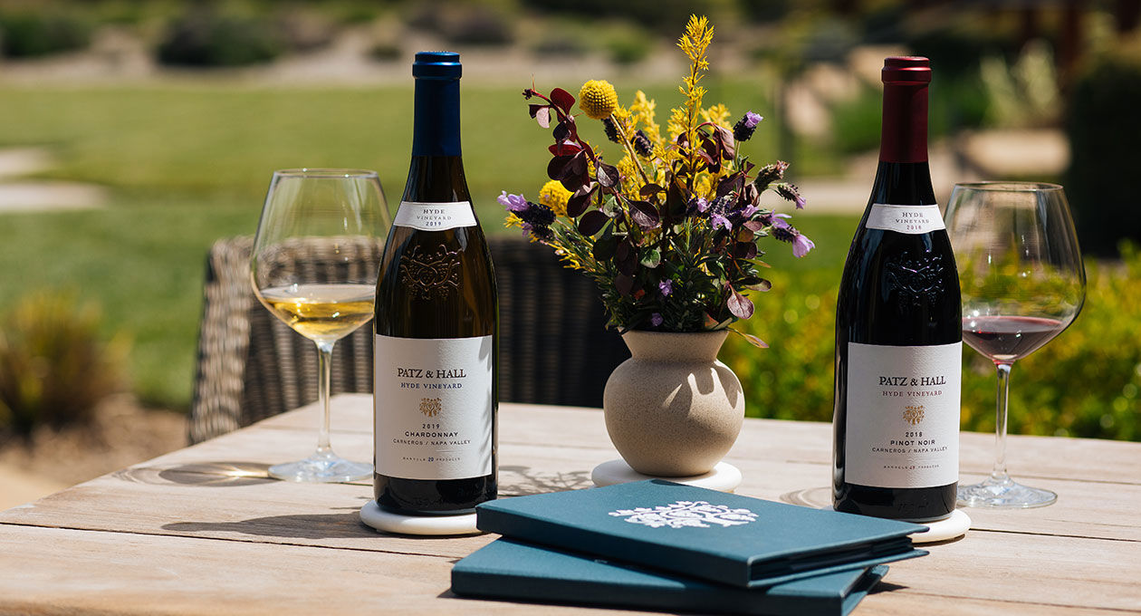 bottles of Hyde Vineyard wine on a table with flowers