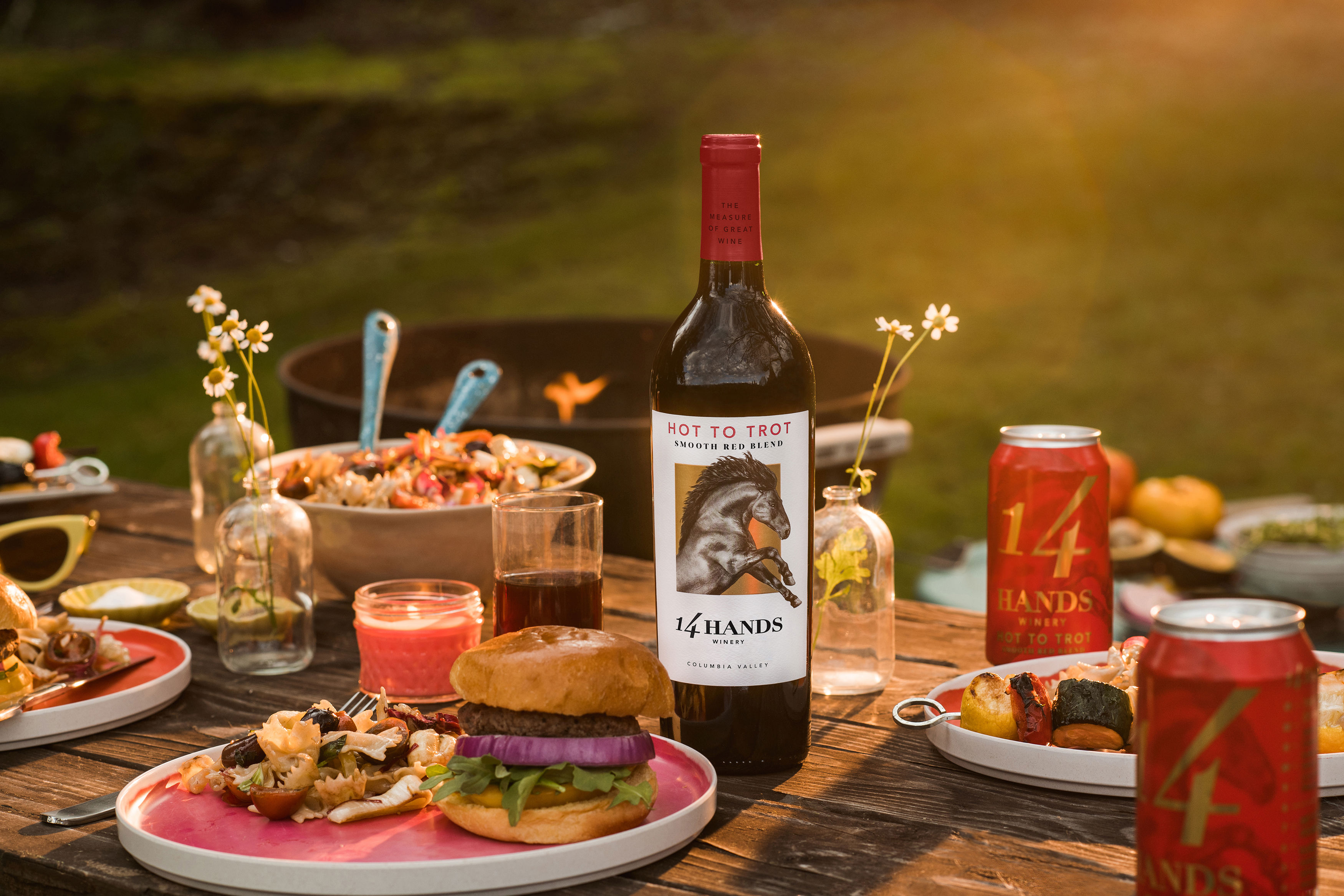Bottle of Hot to Trot on a table with food