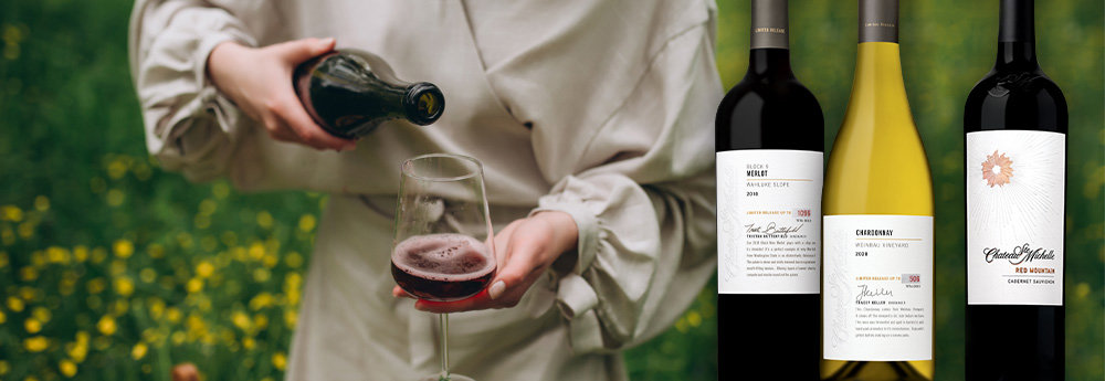 Close-up of a woman pouring a glass of red wine