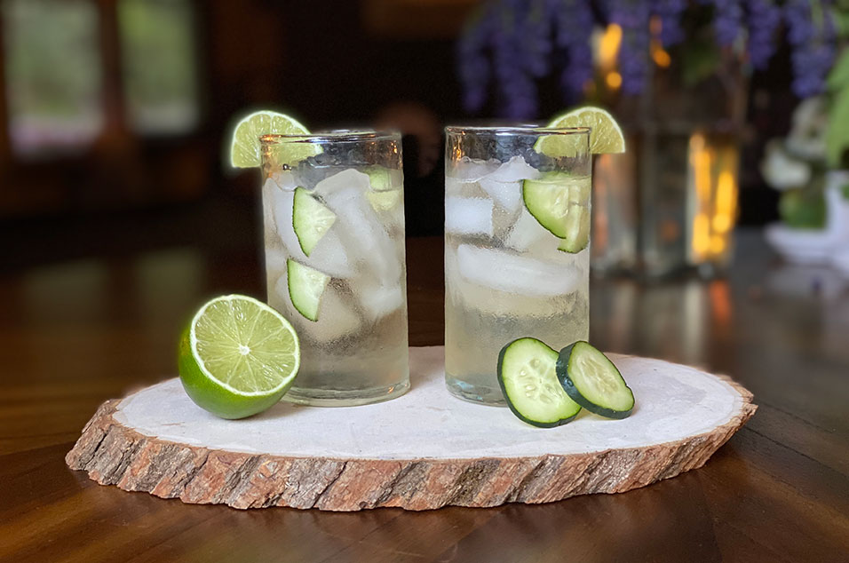 Two drinks sitting on a table