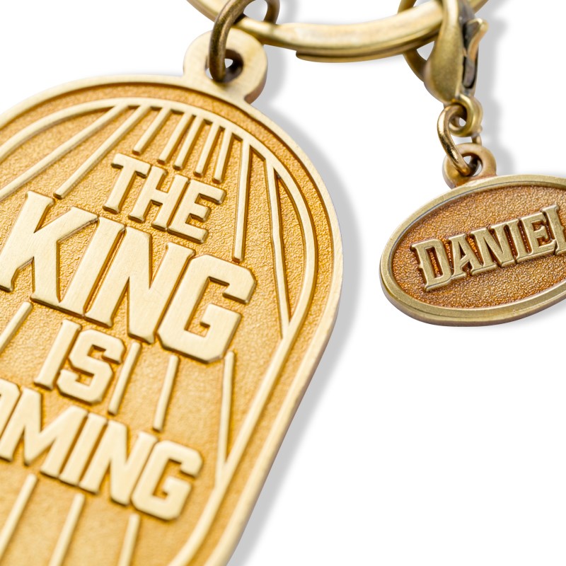 DANIEL KING IS COMING GOLD METAL KEYCHAIN WITH CHARM