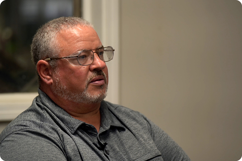 Customer being interviewed in office setting
