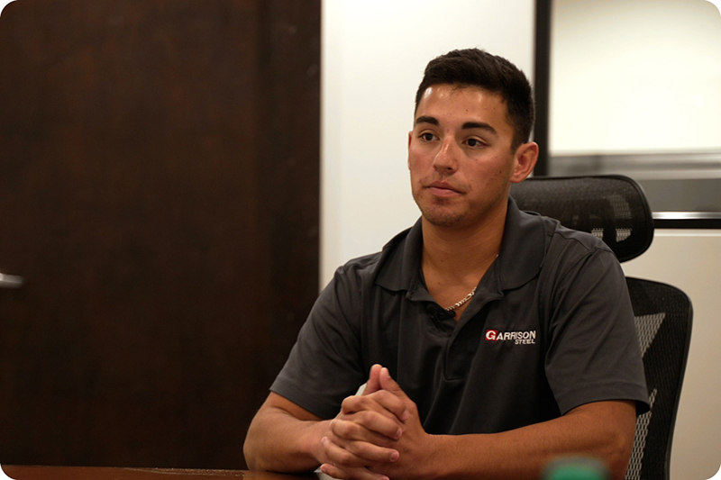 Customer being interviewed in office setting